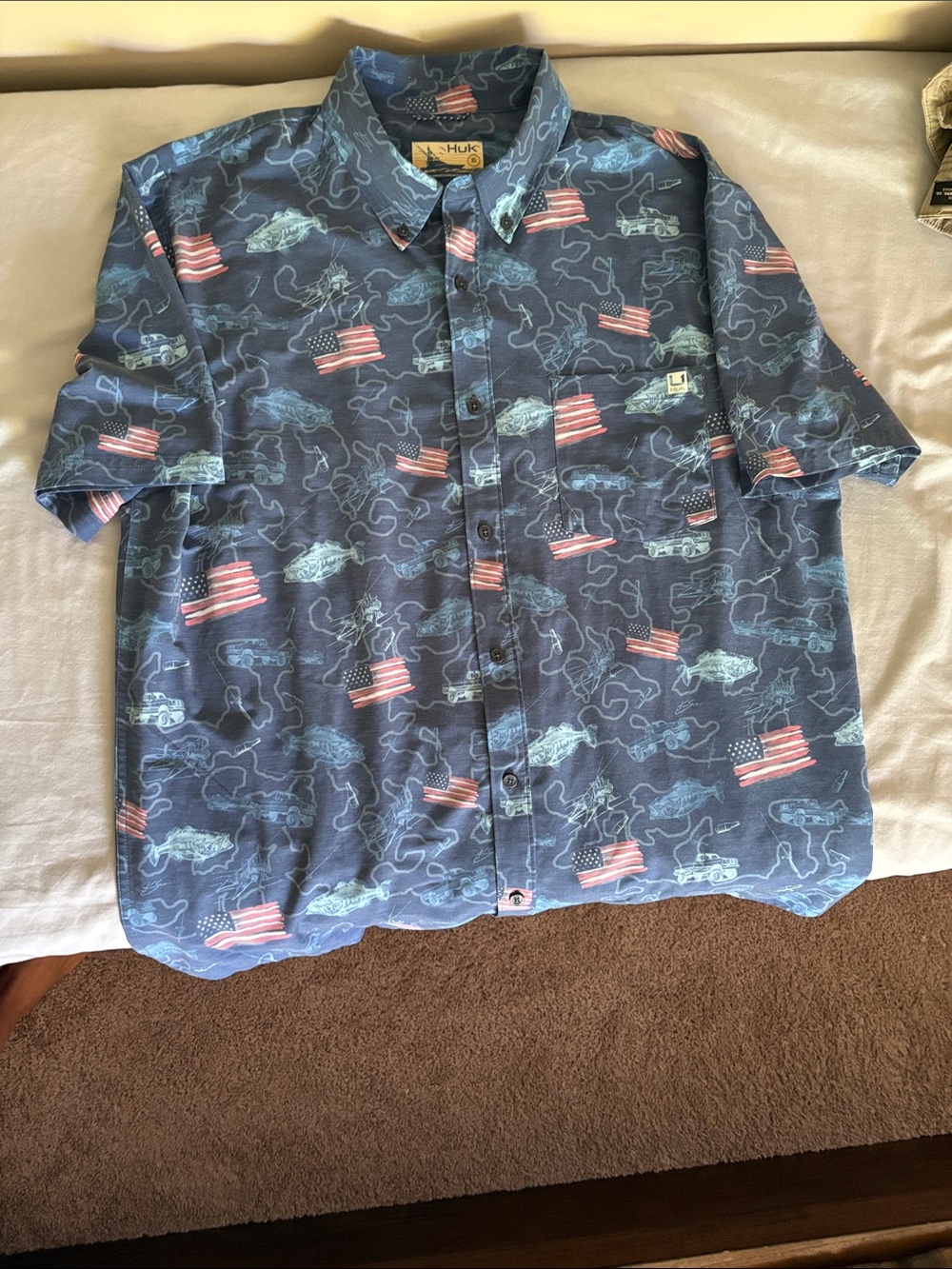 Huk Men’s Short Sleeve Blue Button-Up Shirt with Red & White Flag Print